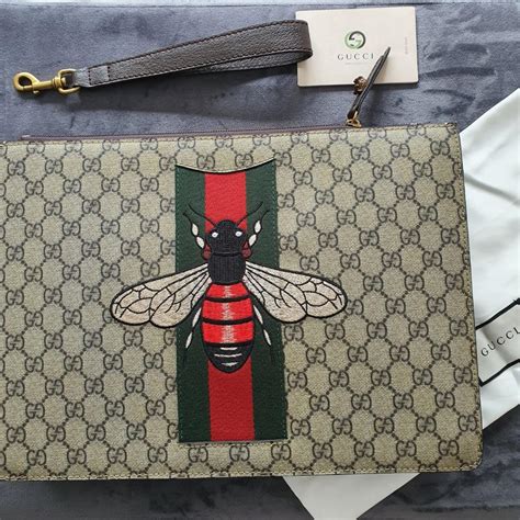 gucci red bee clutch|Gucci snakeskin clutch.